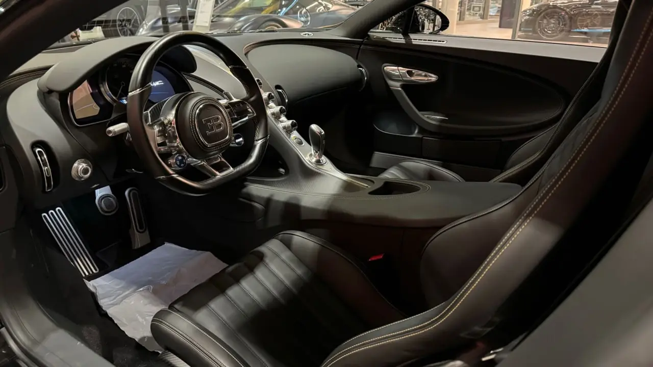 Bugatti Chiron 110 Ani 2019, interior — St. Tropez Luxury Car, Saint-Tropez. Bugatti Chiron 110 Ani in Saint-Tropez The Bugatti Chiron 110 Ani, a 2019 supercar, is…