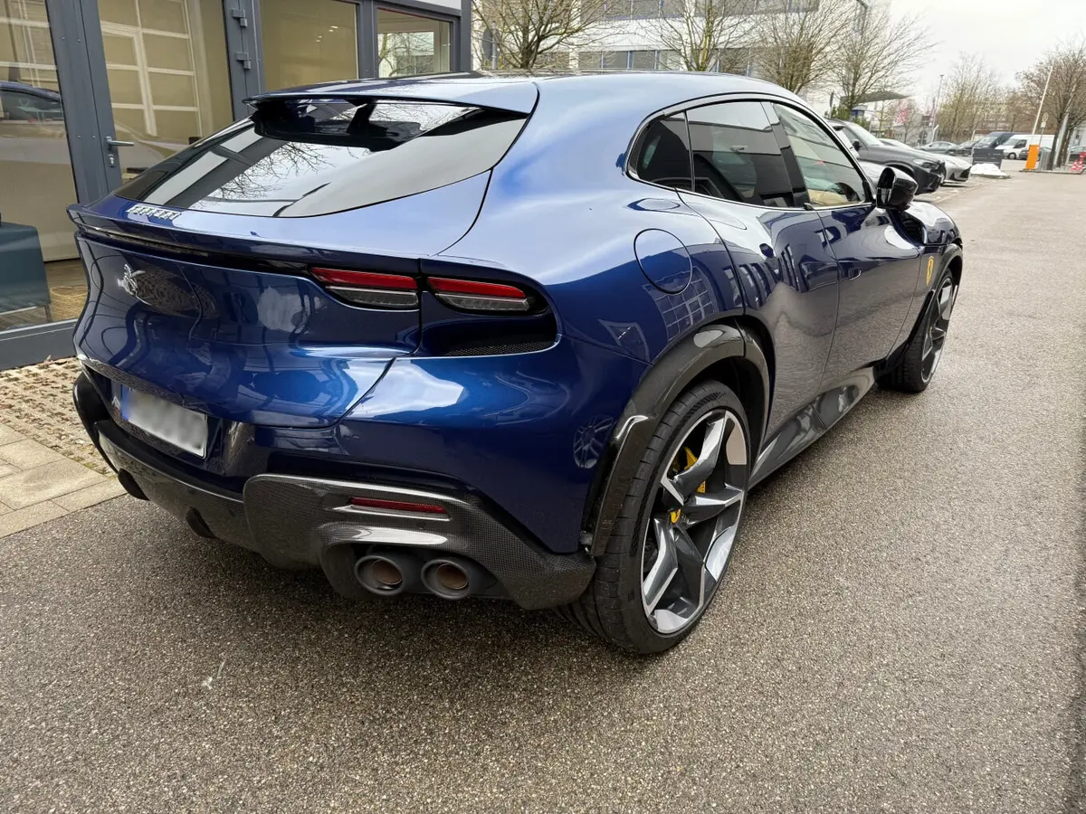 Ferrari Purosangue 2024, exterior — St. Tropez Luxury Car, Saint-Tropez. Ferrari Purosangue in Saint-Tropez The Ferrari Purosangue 2024 is available to rent in…