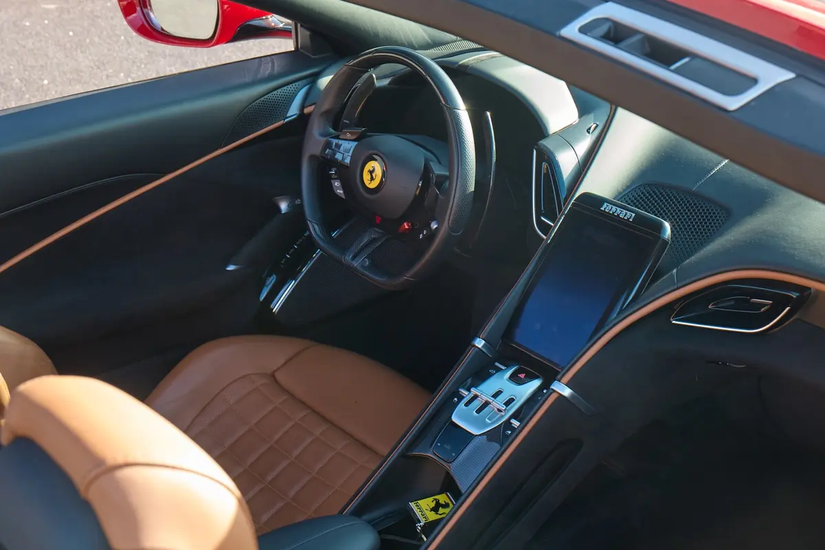 Ferrari Roma Spider 2024, rear view — St. Tropez Luxury Car, Saint-Tropez. Ferrari Roma Spider in Saint-Tropez The Ferrari Roma Spider is available for rental in…